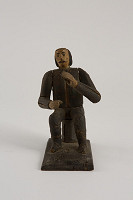 Slovenský rezbár z 19. storočia – Sediaci muž 