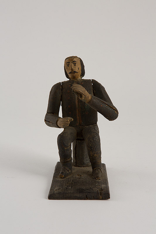 Slovenský rezbár z 19. storočia – Sediaci muž