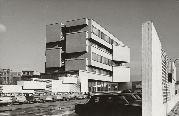 Vladimír Dedeček – Shared administrative building of the Directorate of Poultry Production and the Construction and Project Centre of Bridge-Production Plant Brezno. View of the entrance façade with parking in front of the building 